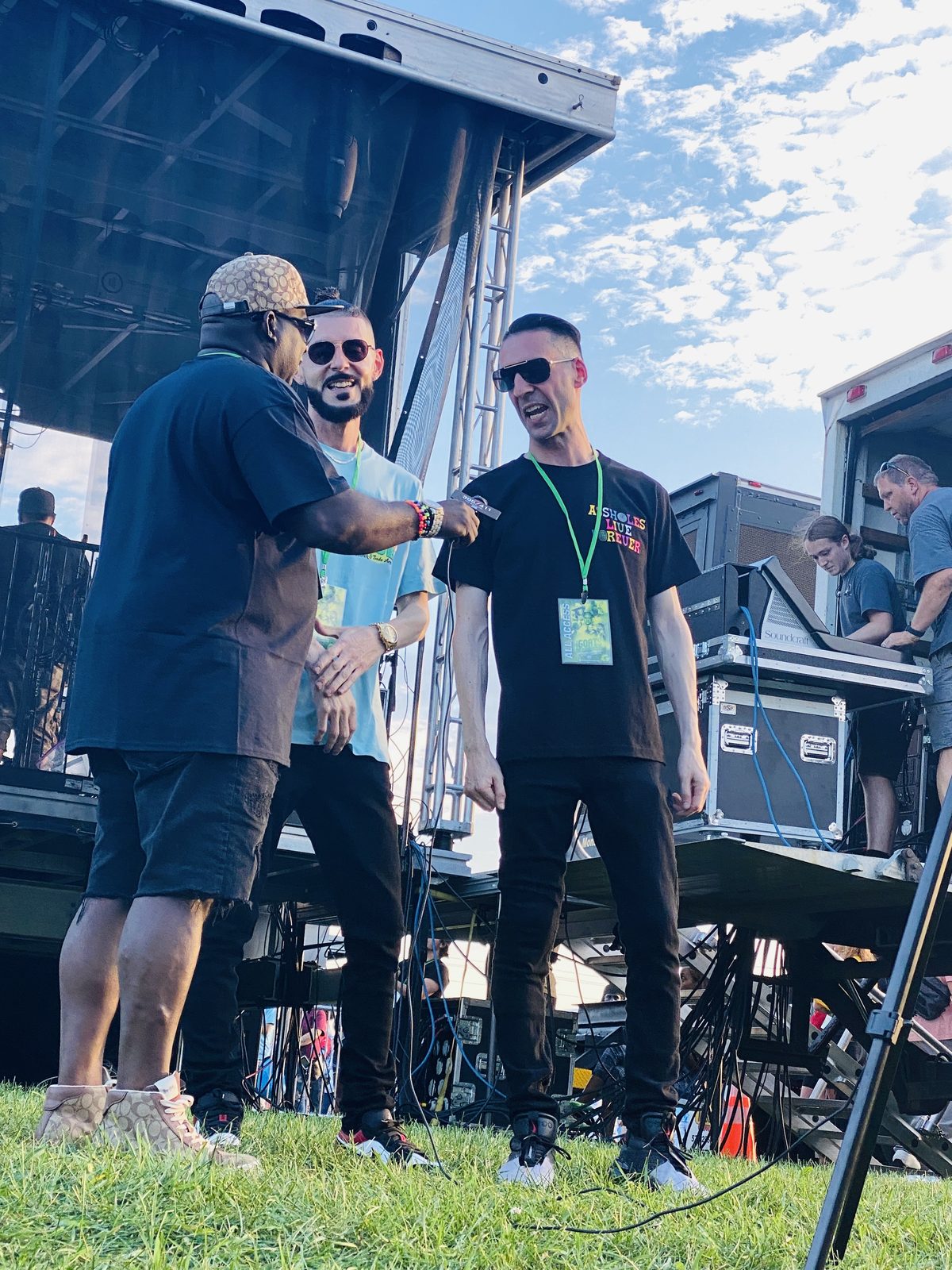 KING T and LUSS greeting friends backstage