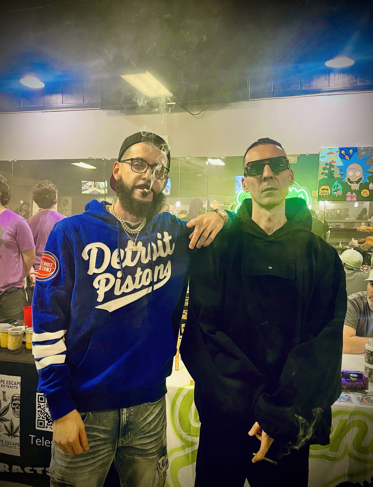 KING T and LUSS with a friend in a Detroit jersey